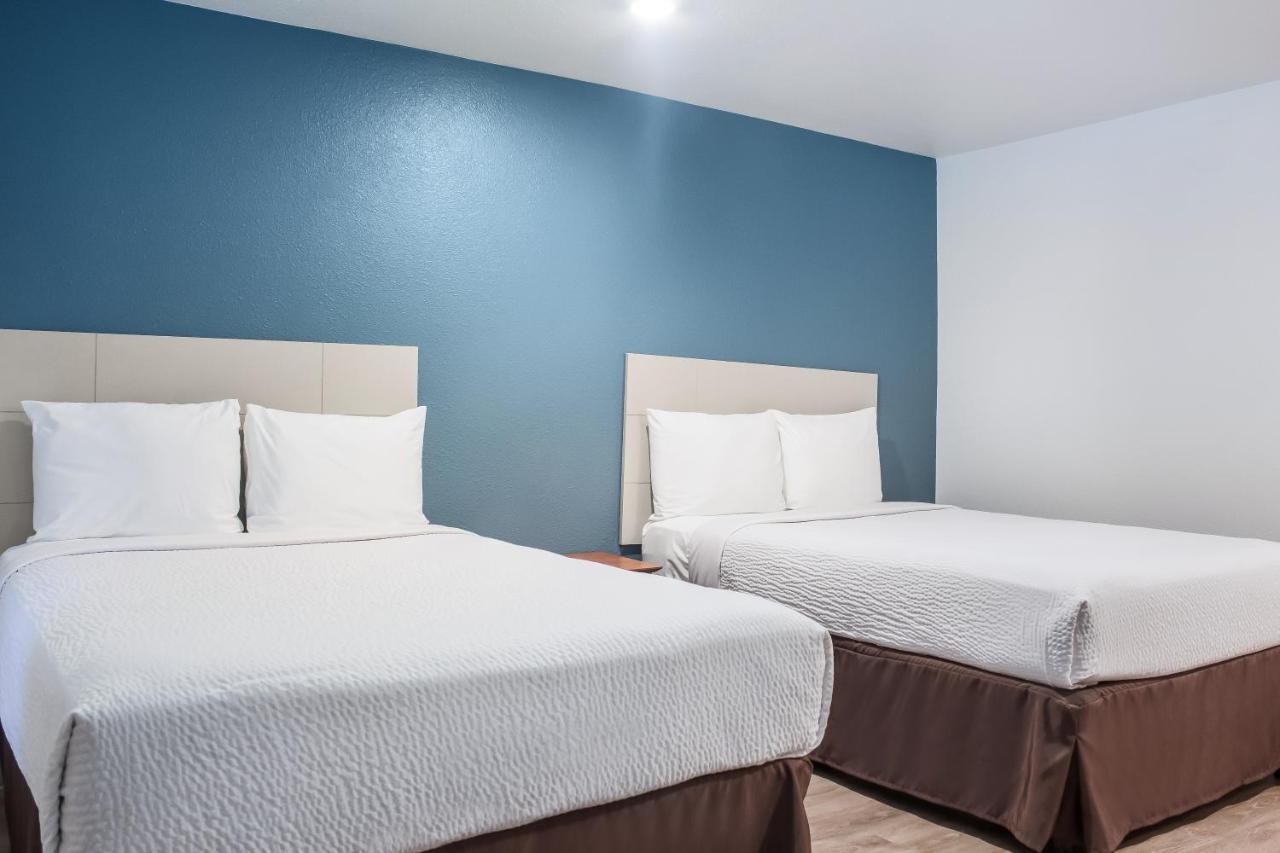 Woodspring Suites Conroe Exteriör bild
